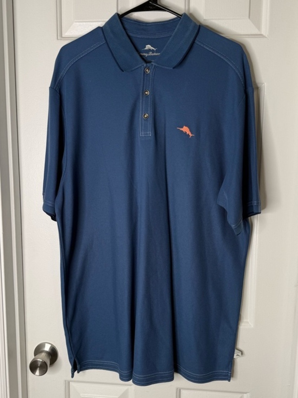 Tommy Bahama Navy Blue Polo with Coral Dolphin Logo